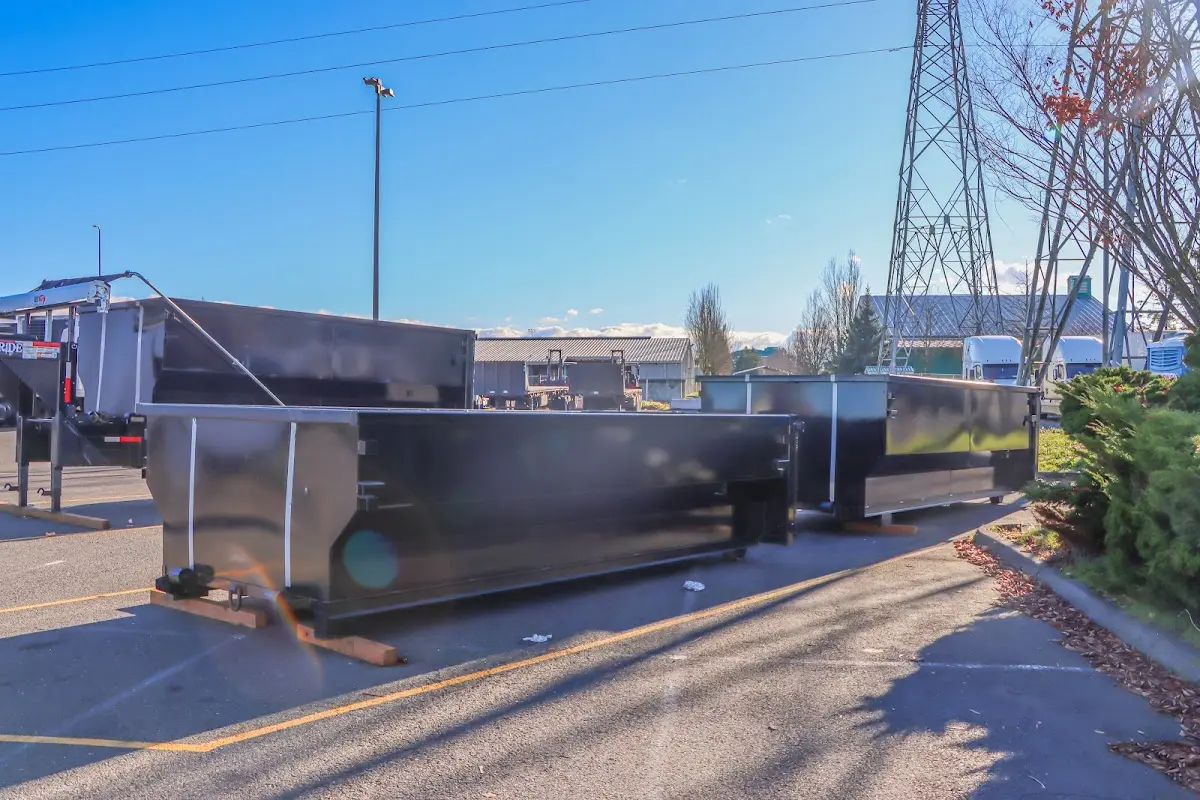 Roll-off dumpster ready for waste disposal at job site for 15 Yard Dumpster Rental in Holland
